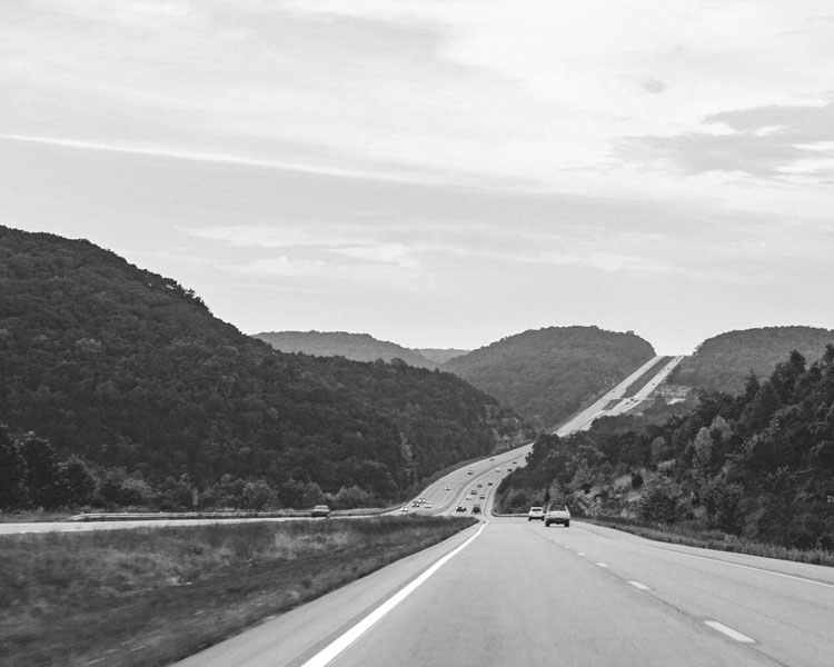 Picture of a road leading into the mountains